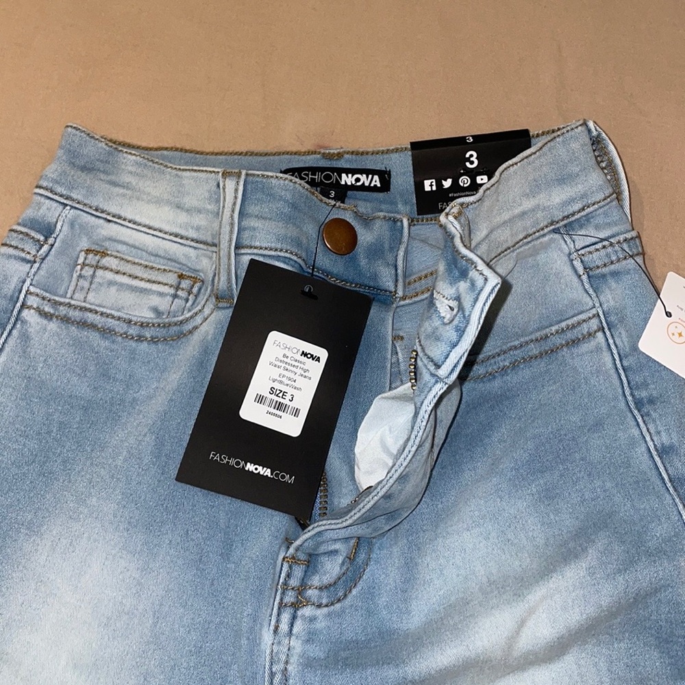 Fashion Nova Light Wash Ripped Jeans